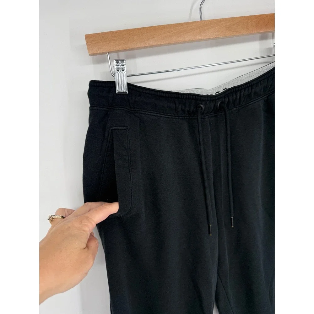 Nike Womens Rally Pants‎ Loose Joggers Black Sweatpants Size M Flip Waistband